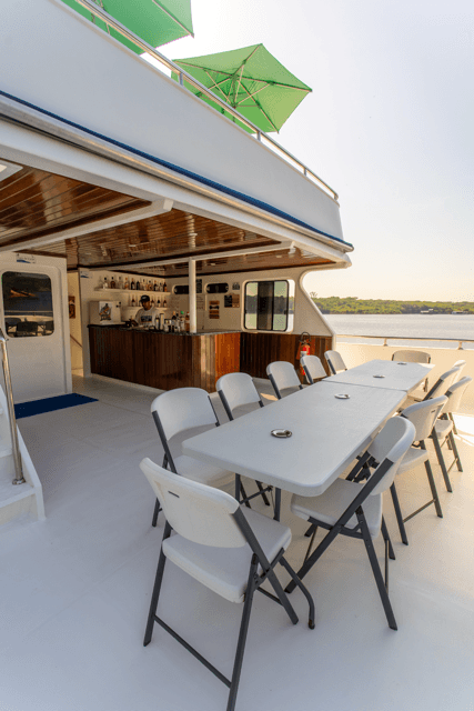 Amazon Lord III modern amenities - TV lounge, dining area, and solarium deck